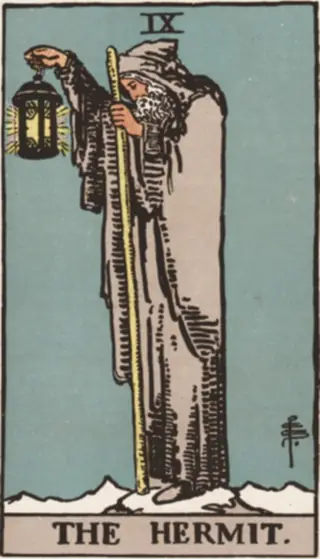 The Hermit: a hooded figure alone on a snowy height, a lantern held out in one hand and a long staff in the other.